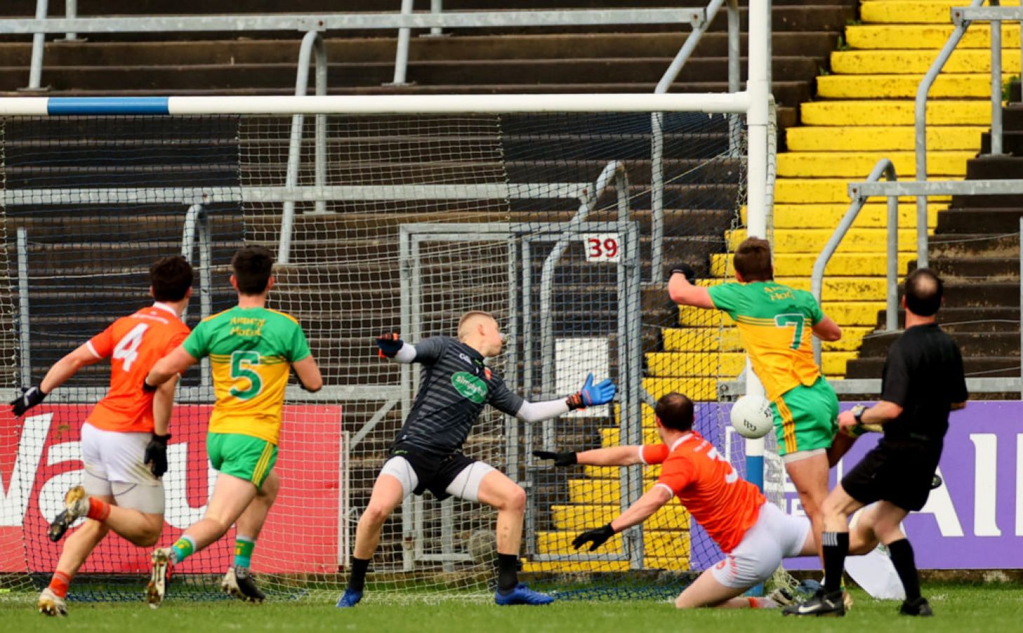 Donegal's Peadar Mogan Fires A Shot Past Blaine Hughes Of Armagh. Photo: James Crombie/Inpho