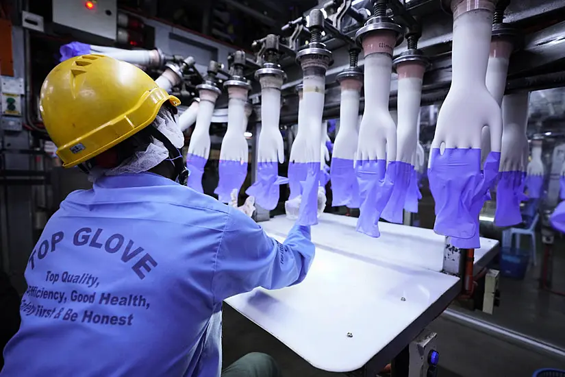 Malaysia Virus Outbreak Delays Production At World’s Top Glove Maker