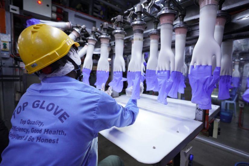 Malaysia Virus Outbreak Delays Production At World’s Top Glove Maker