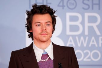Harry Styles Takes Swipe At Critics Of His Love Of Ballgowns