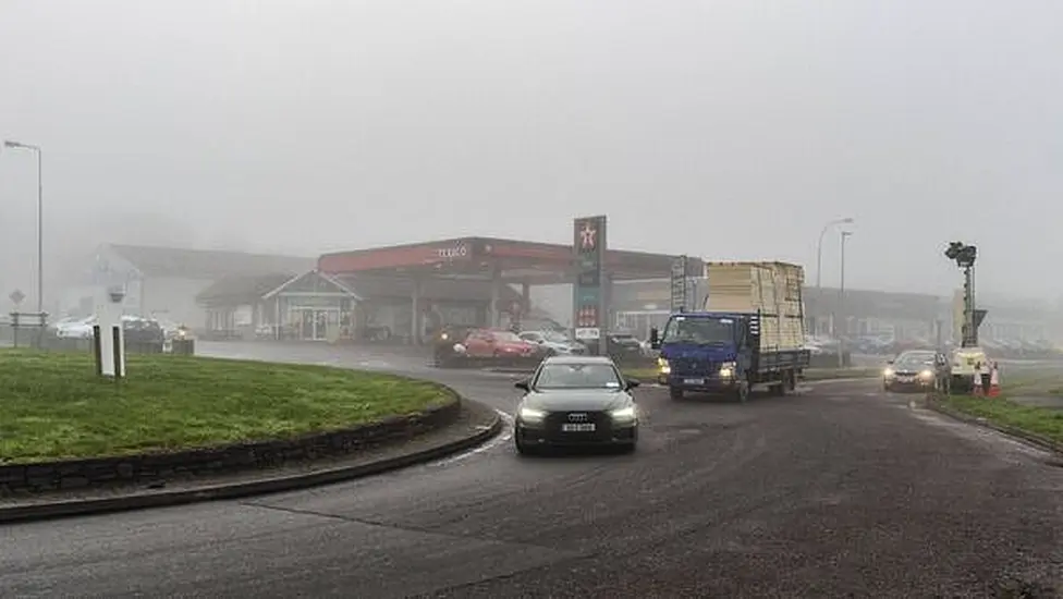 Dangerous Driving Conditions With Widespread Fog And Icy Roads