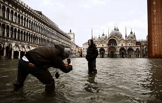 Venice Under Water As Downpours And Wind Take City By Surprise