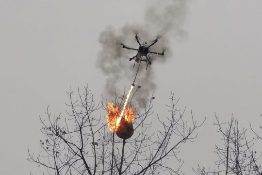 Drone with store a flamethrower