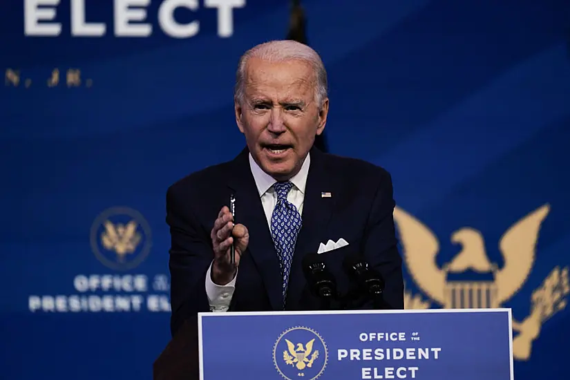 Biden Addresses Covid Bill And Holiday Pandemic Precautions