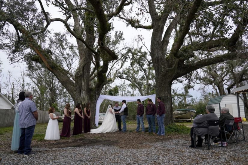 Hurricanes And Coronavirus Can’t Stop Louisiana Couple’s Wedding