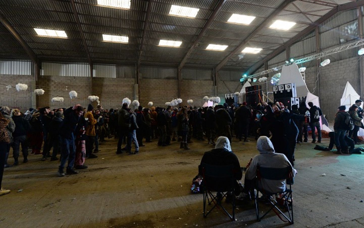 People Dance During The Party In A Disused Hangar. Photo: Jean-Francois Monier/Afp Via Getty Images