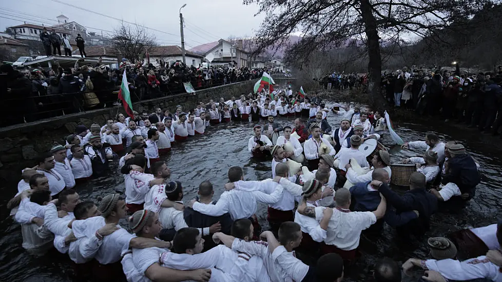 Orthodox Christians Mark Epiphany With River Plunge Despite Covid Warnings