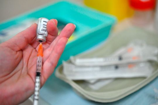 Another Year Of Restrictions Needed As Vaccine Is Rolled-Out, Says Top Doctor