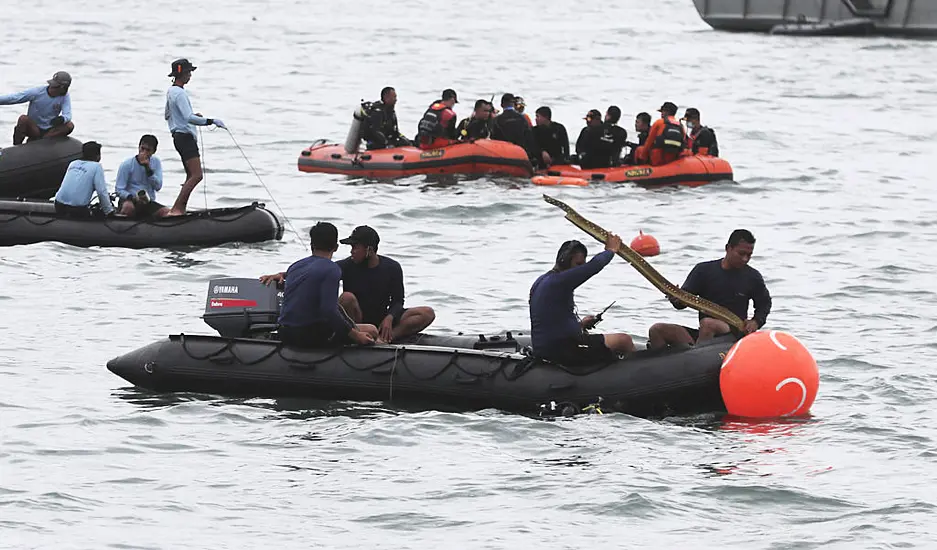 Indonesian Divers Find Parts Of Plane Wreckage In Java Sea