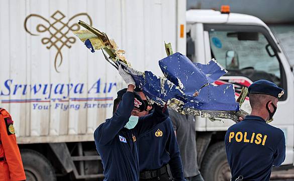 Divers Sift Through Debris And Seabed Mud For Indonesia Plane Black Boxes