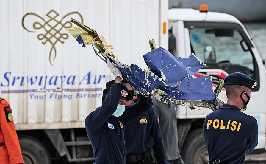 Divers Sift Through Debris And Seabed Mud For Indonesia Plane Black Boxes