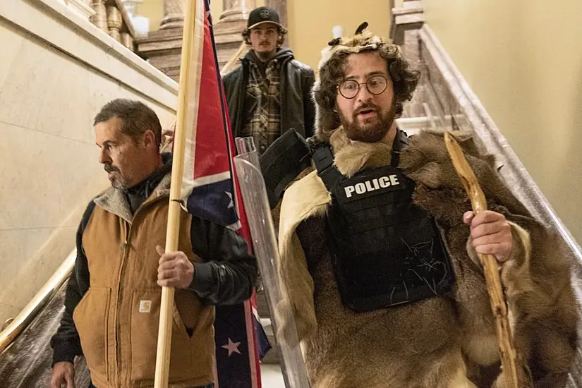 Man Carrying Confederate Flag During Capitol Riot Arrested