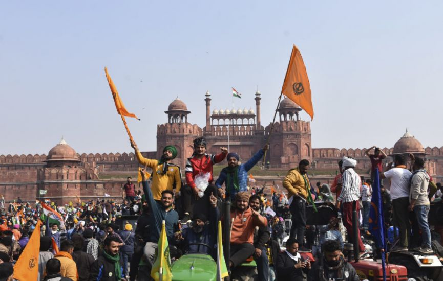 Angry Farmers Storm Historic Fort In Huge Tractor Rally In New Delhi
