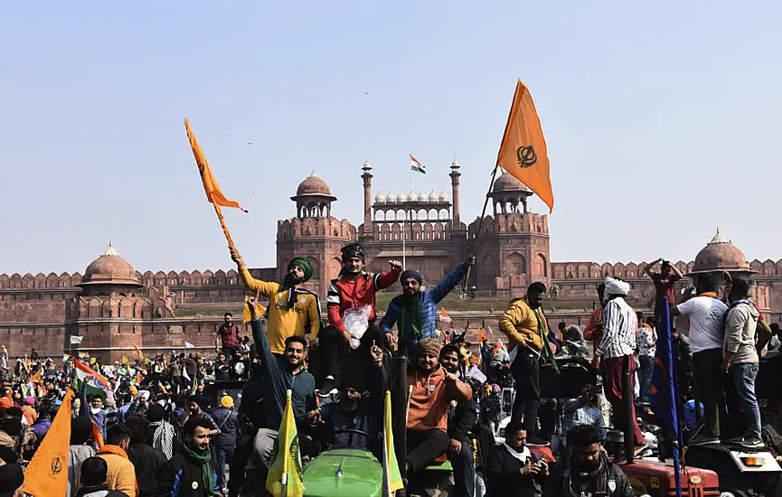 Angry Farmers Storm Historic Fort In Huge Tractor Rally In New Delhi