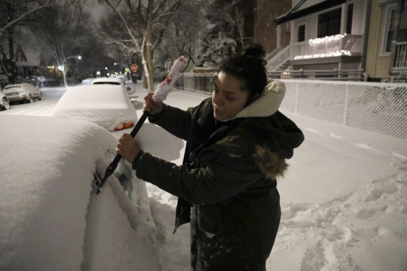 Foot Of Snow Blankets Parts Of Us Mid West, Disrupting Travel