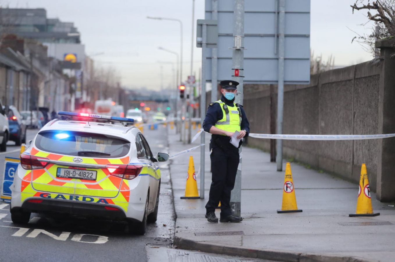 Garda At The Crime Scene In East Wall Road On Wednesday. Photo: Niall Carson/Pa