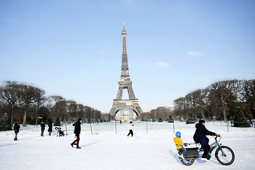 Eiffel Tower Needs Blowtorch For Ice As Snow Blankets Europe