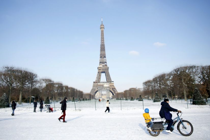 Eiffel Tower Needs Blowtorch For Ice As Snow Blankets Europe