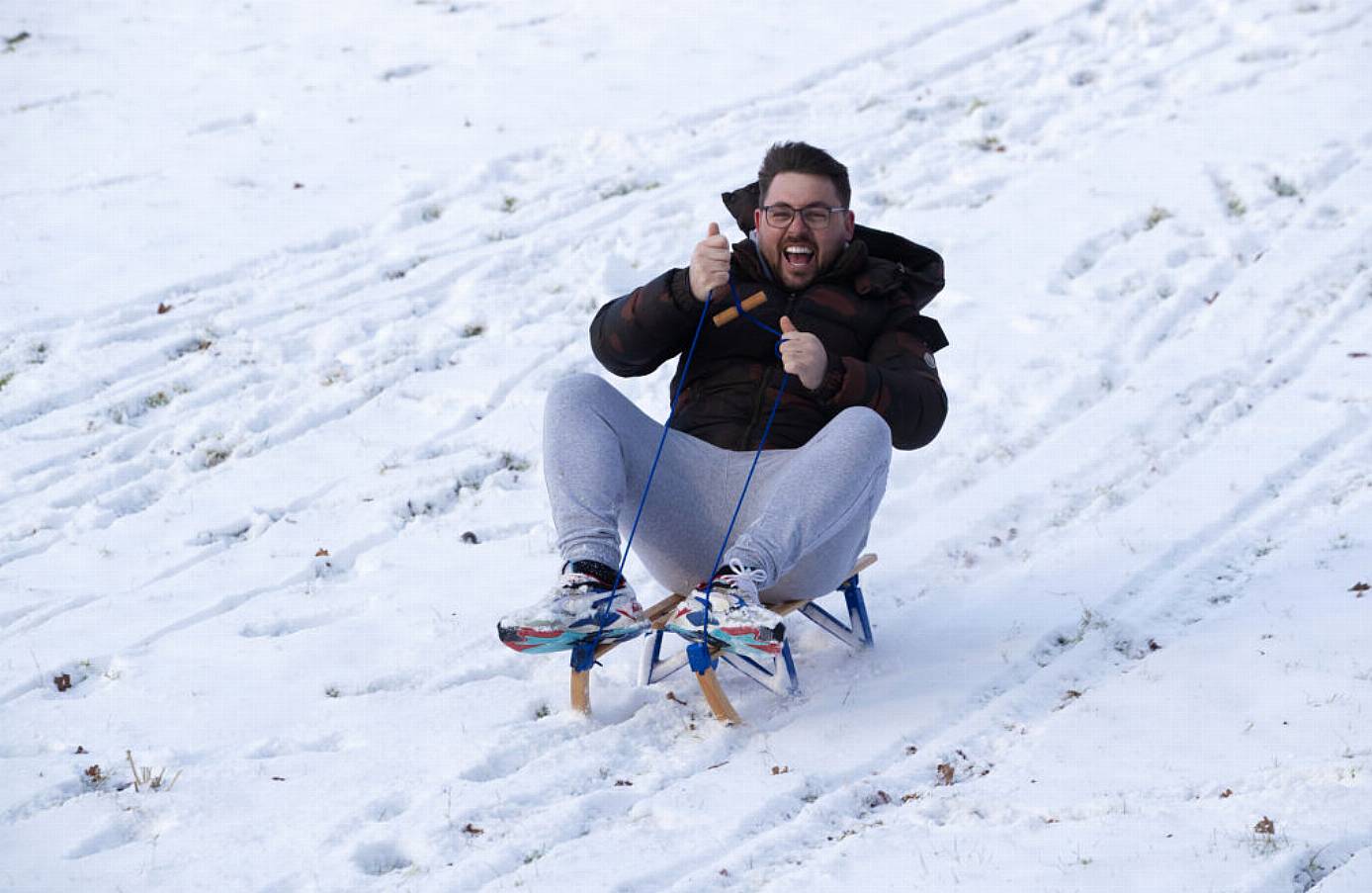 Robbie Mills Sleds Down A Hill In The Wicklow Mountains. Photo: Pa Images.