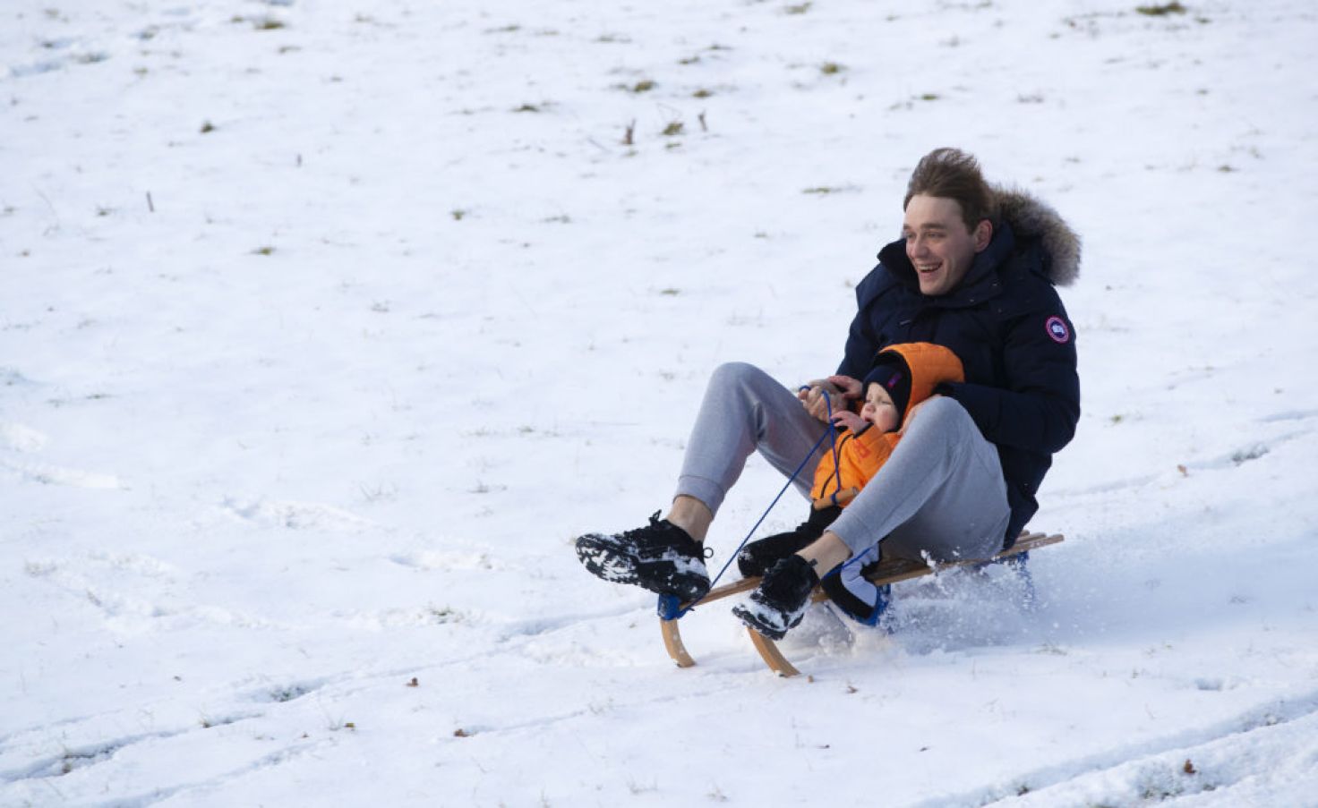 James Lawrence And His Son Danny Lawrence (1) Sled Down A Hill In The Wicklow Mountains. Photo: Pa Images.