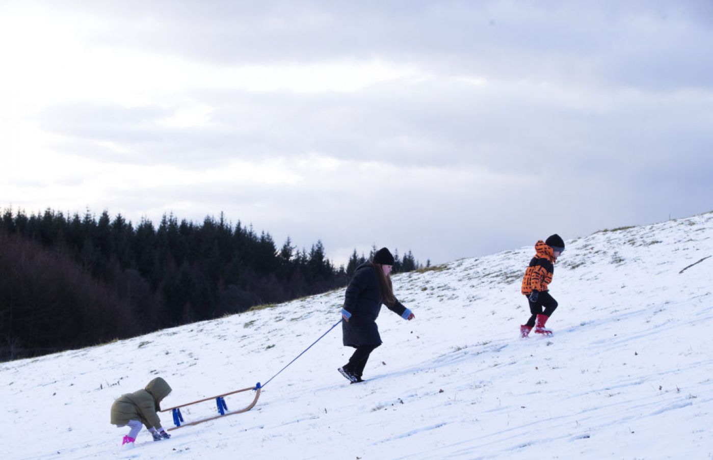 From Left, Bonnie Lawrence (4), Emmie Mills (10) And Alex Lawrence (8) Enjoy The Snow In The Wicklow Mountains. Photo: Pa Images.