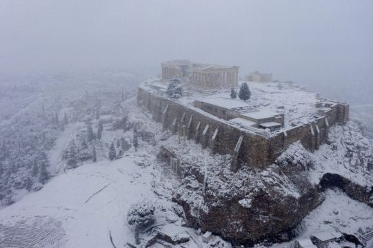 Rare Snow Blankets Acropolis In Athens