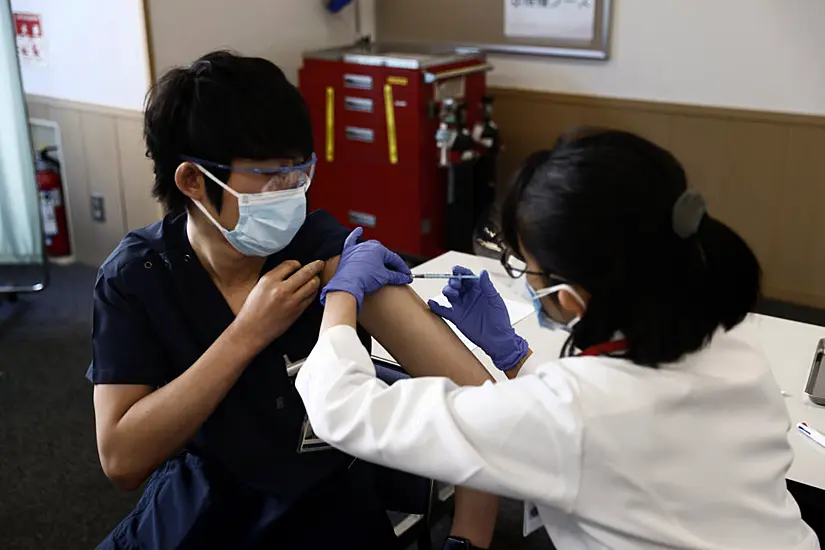 Japan Begins Vaccine Drive Amid Uncertainty Over Olympics