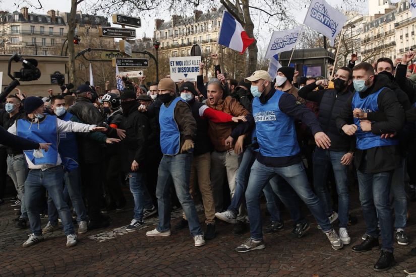 Protesters Oppose Move To Disband French Anti-Migrant Group
