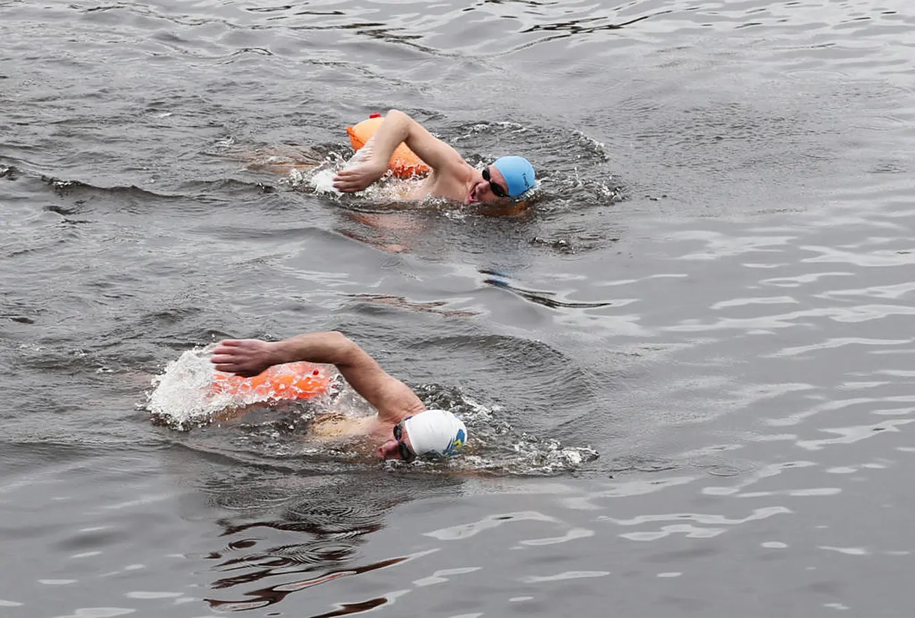 Limerick Ice Swimmers Alan Gleeson,53(Blue Cap) And Harry  Harbison(63) Swim In The Icy Cold Shannon Waters At The Mill Road In Limerick. 
Photograph Liam Burke/Press 22