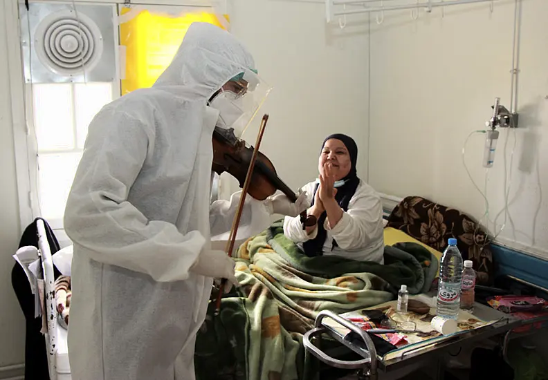 Fiddler On The Wards: Violin-Playing Doctor Cheers Covid Patients In Tunisia