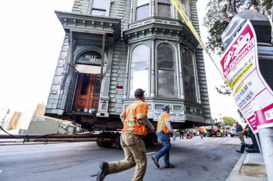 Crowds Gather To Watch 139-Year-Old House Move Through San Francisco