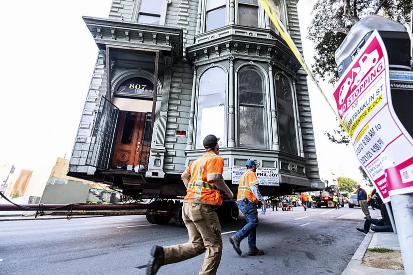 Crowds Gather To Watch 139-Year-Old House Move Through San Francisco