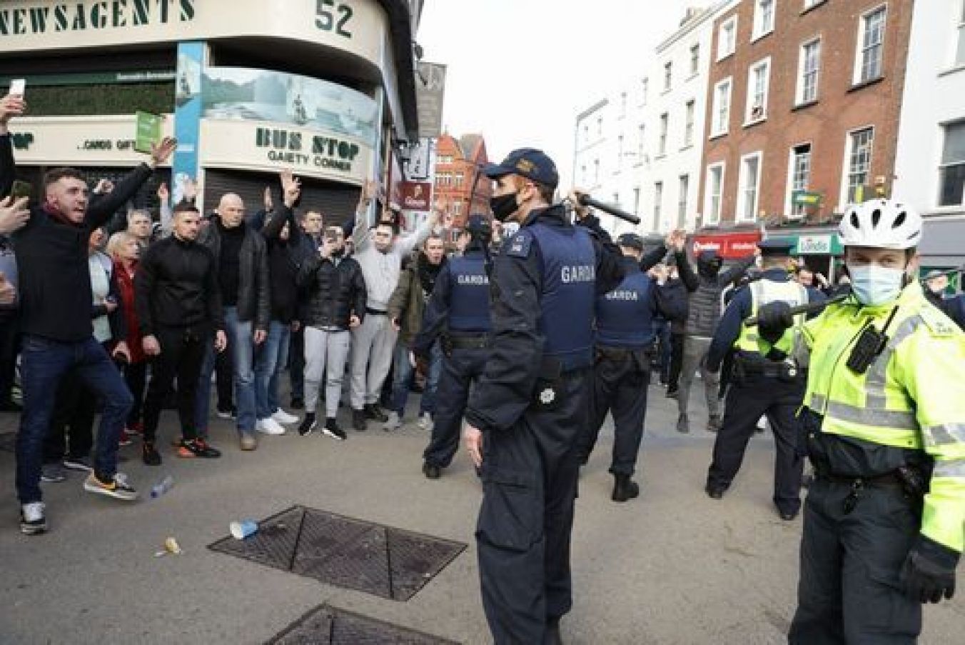 Gardai Talks To Protesters During An Anti-Lockdown Protest In Dublin City Centre.