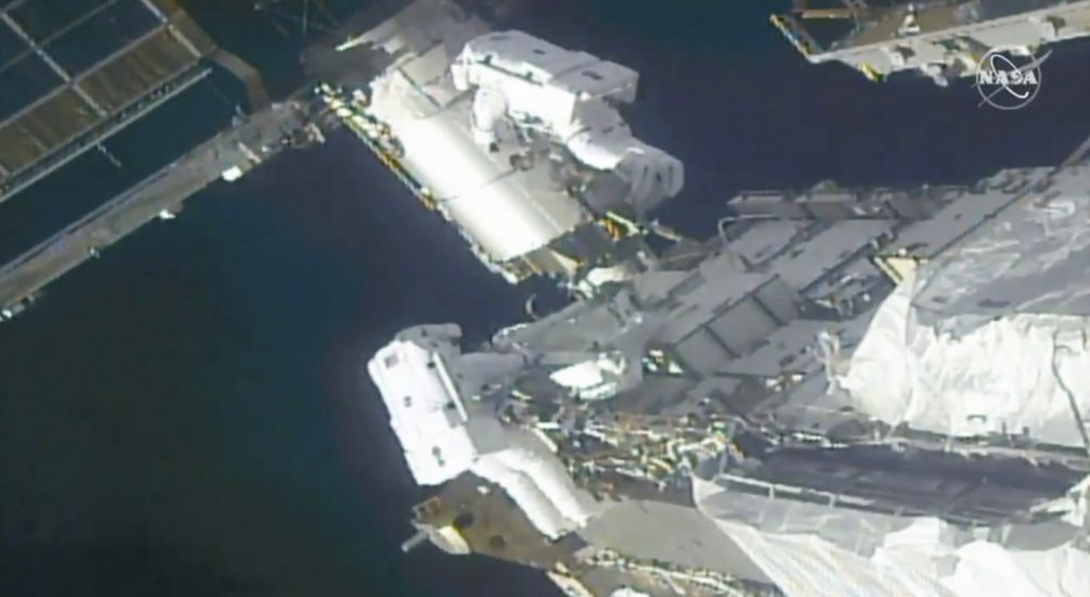 Spacewalking Astronauts Prepare Station For New Solar Wings