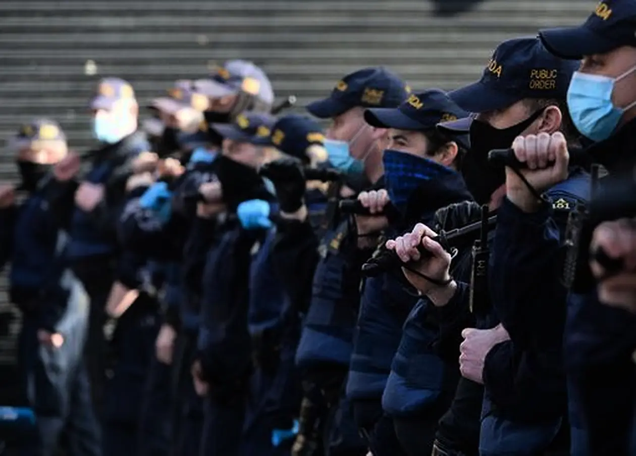 A Line Of Garda Officers In Front Of Anti-Lockdown Protesters On Grafton Street, Dublin, During Level 5 Covid-19 Lockdown. On Saturday, Fabruary 27, 2021, In Dublin, Ireland. (Photo By Artur Widak/Nurphoto)
