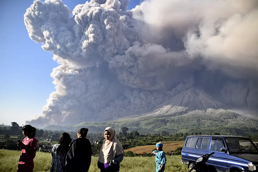 Erupting Indonesian Volcano Covers Villages In Ash