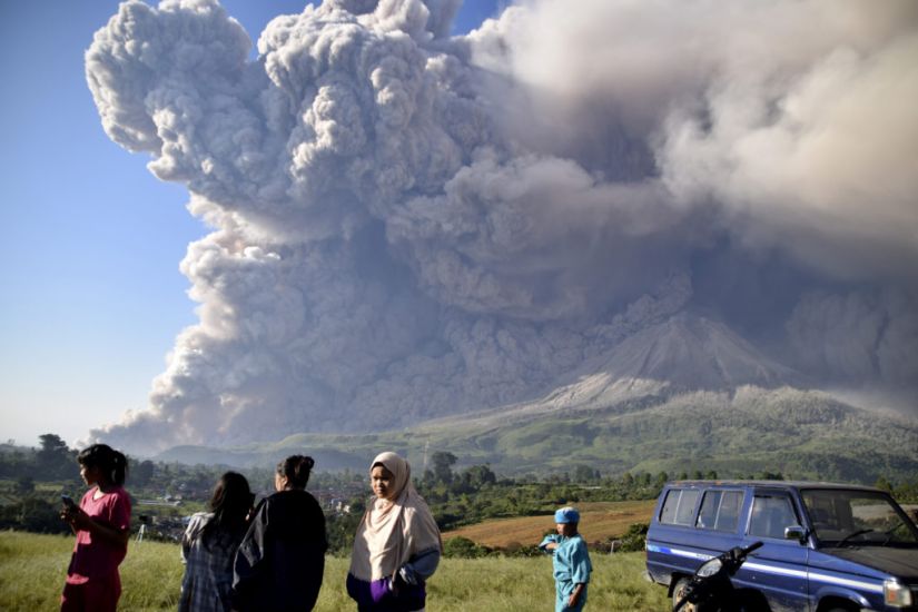 Erupting Indonesian Volcano Covers Villages In Ash