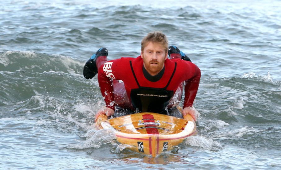 Surfer Raises Thousands For Depression Charity Through Night Swims