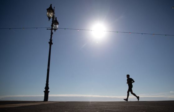 Joggers Should Wear A Mask When Running Past Others, Experts Say