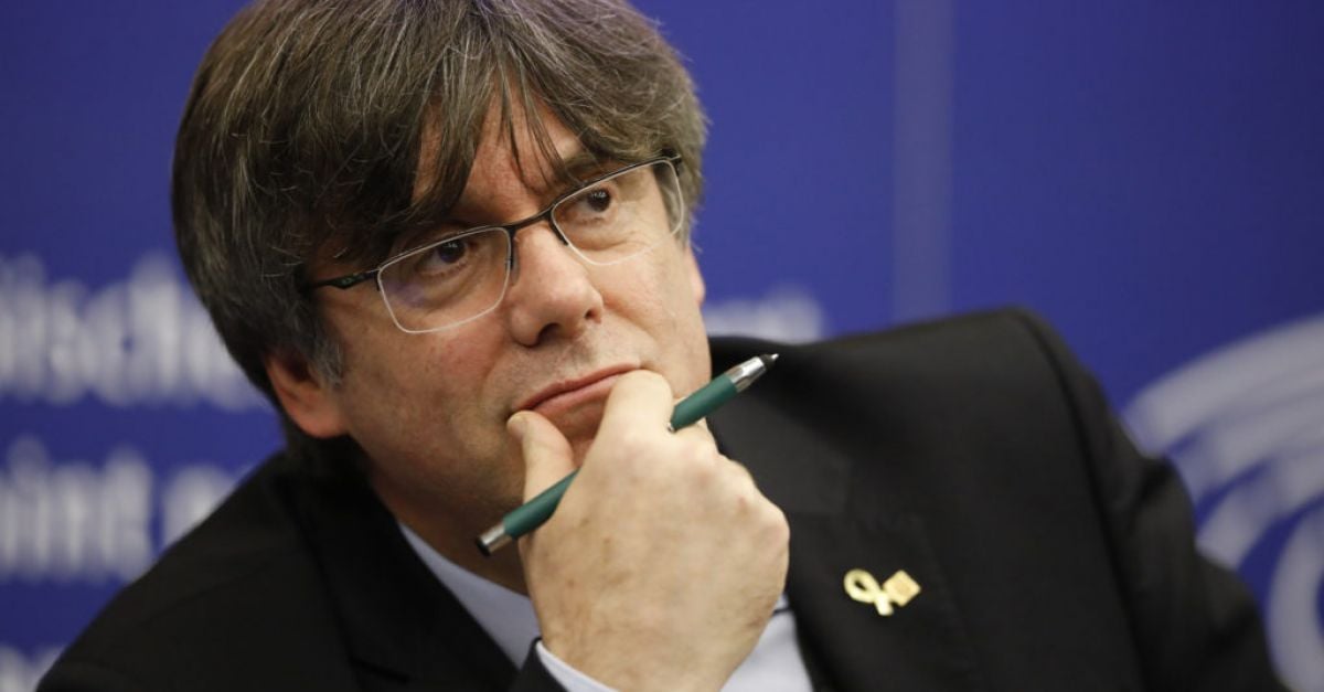 Exiled Catalan leader sets tough terms for talks on Spain's new PM