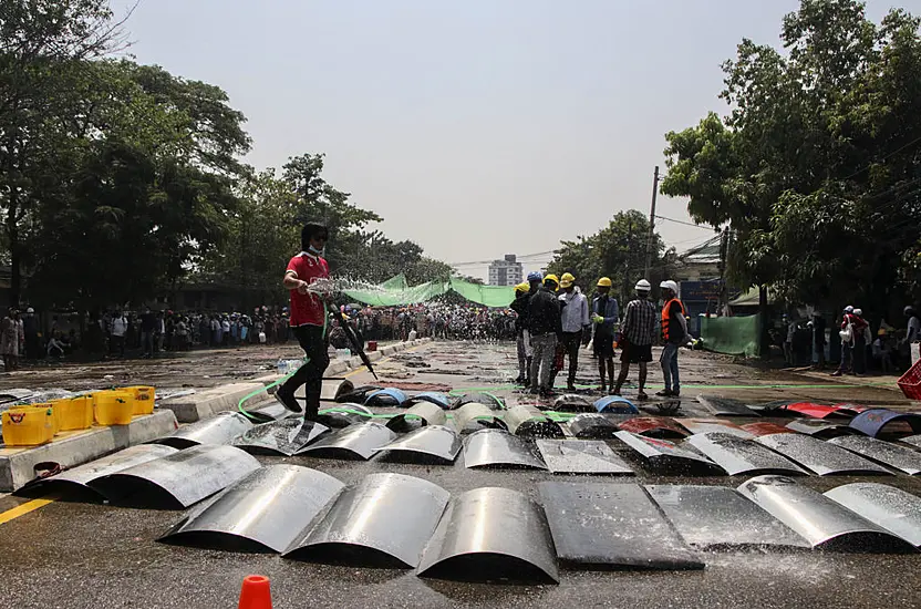 Protesters Continue To Defy Security Forces In Myanmar