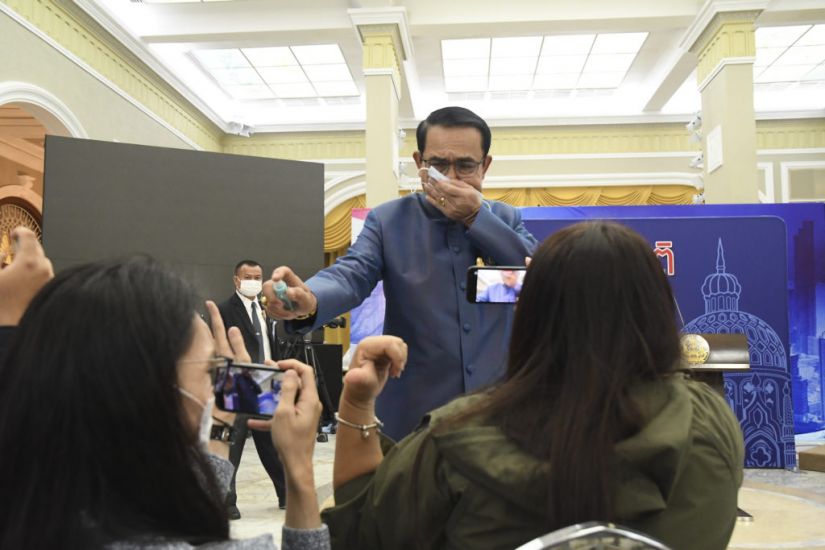Thailand’s Prime Minister Sprays Journalists With Hand Sanitiser