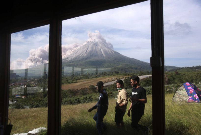 Indonesian Volcano Spews Gas Clouds As Villagers Keep Distance