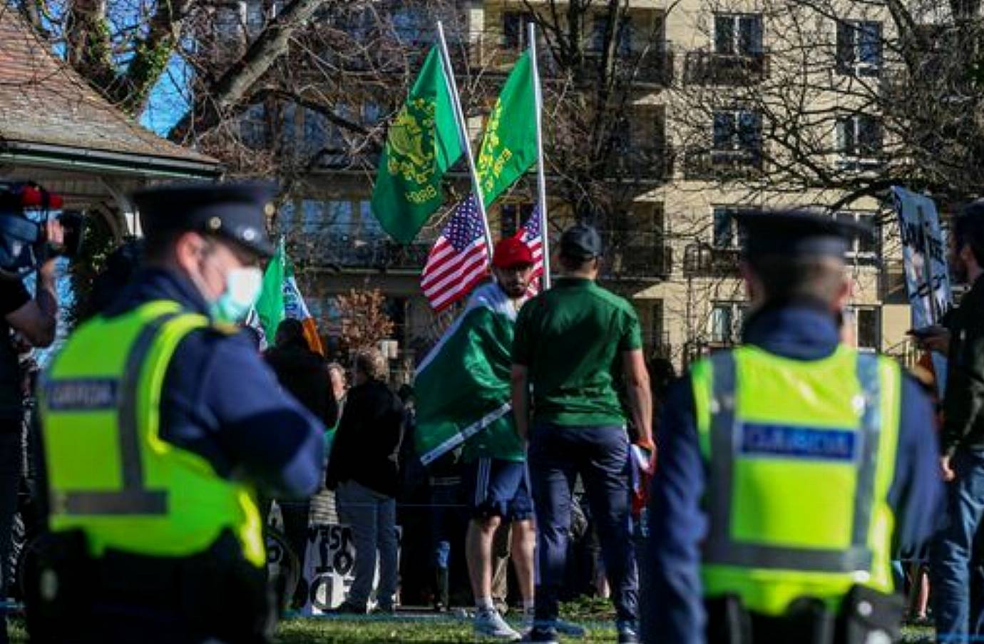 Gardi Patrol As Anti-Lockdown Protesters Gather At Herbert Park In Dublin. Picture Date: Wednesday March 17, 2021.