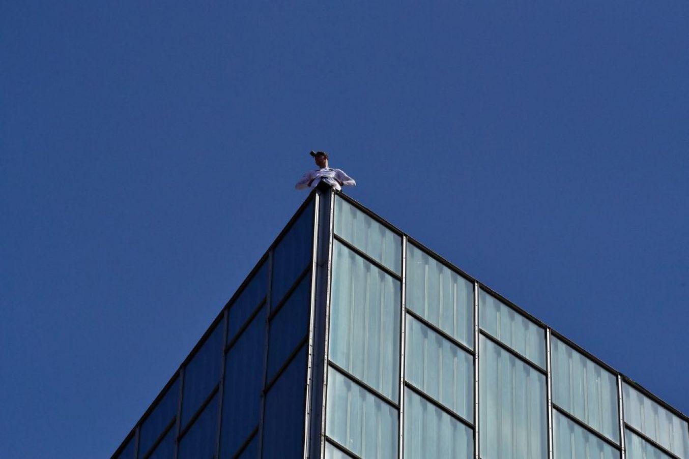 George King Observes The View After Free-Climbing The Building. Photo: Pau Barrena/Afp Via Getty Images