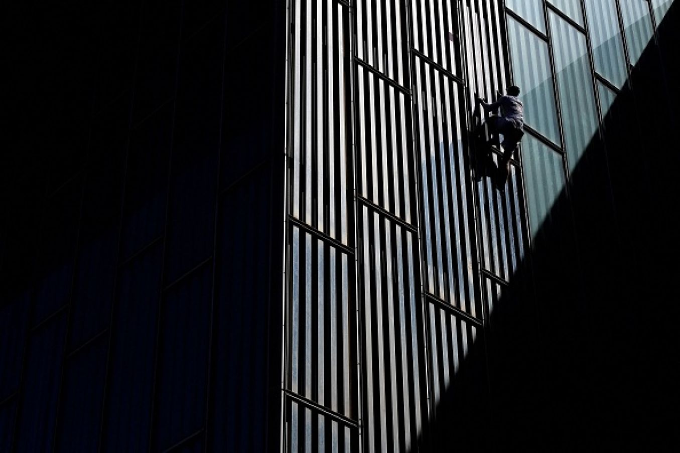 British Skyscraper Climber George King Free-Climbs The Melia Barcelona Sky Hotel. Photo: Pau Barrena/Afp Via Getty Images