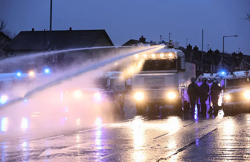 Police Use Water Cannon As Violence Flares Again In North