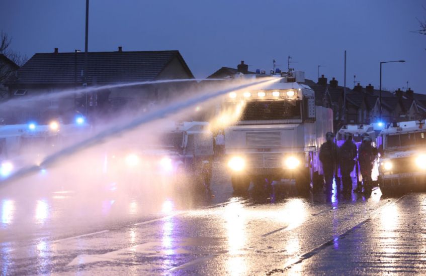 Police Use Water Cannon As Violence Flares Again In North