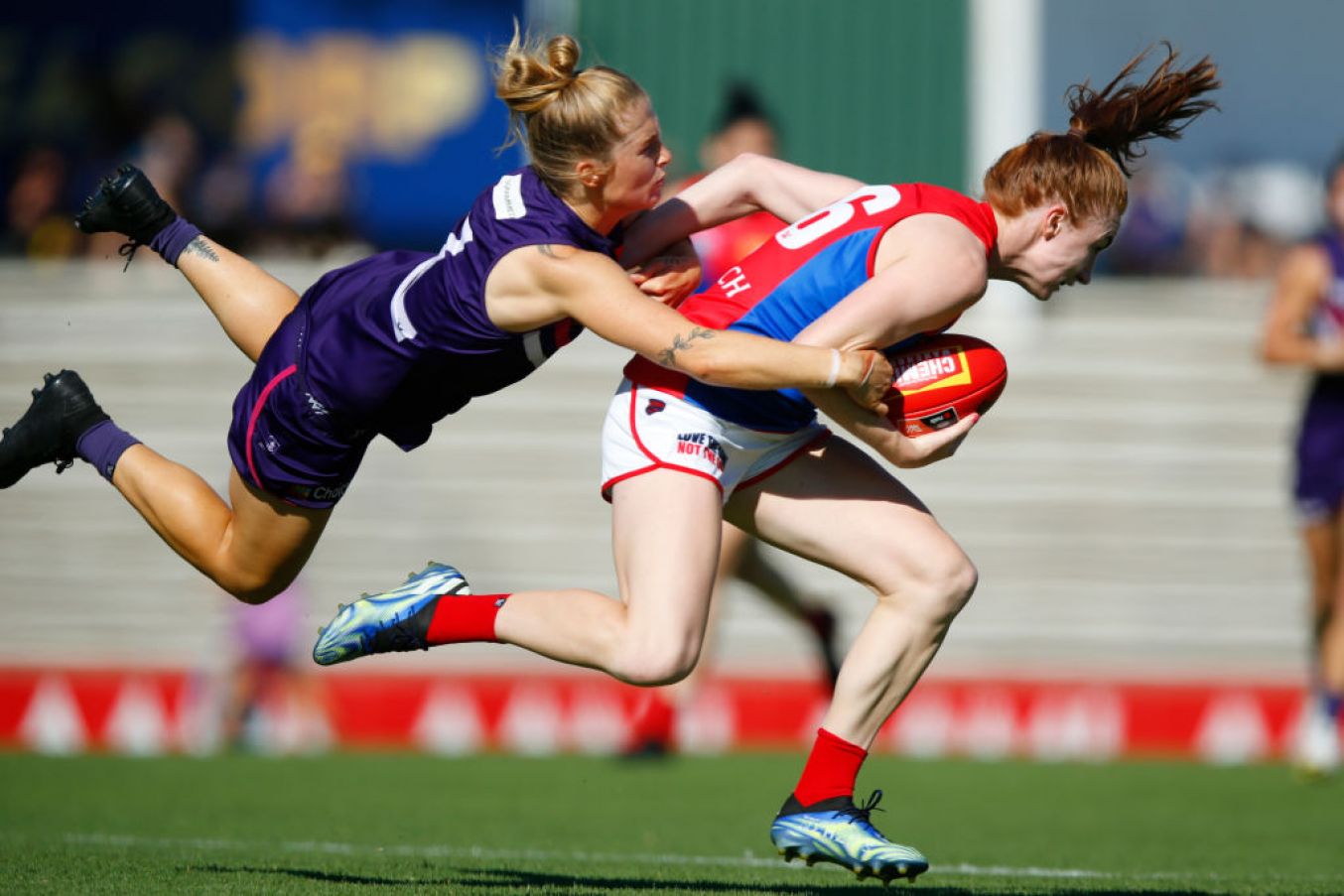 Jasmin Stewart Tackles Lauren Magee (Dublin) Of The Melbourne Demons During Their Round 8 Match Against The Fremantle Dockers. (Photo By James Worsfold/Getty Images)