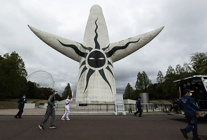 Japan Raises Coronavirus Alert Level Near Tokyo Months Ahead Of Olympics